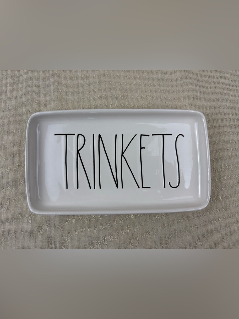 Rae Dunn by Magenta White Ceramic Tray Labeled “TRINKETS” in Black Lettering